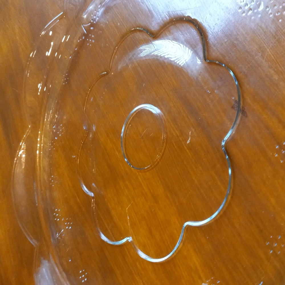 This is a designer crystal serving platter